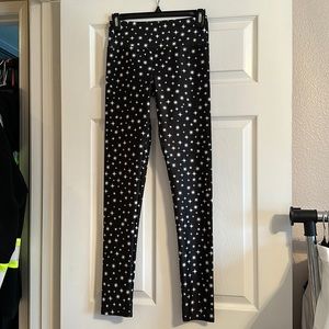 Worn once. GOLDSHEEP black leggings with white stars